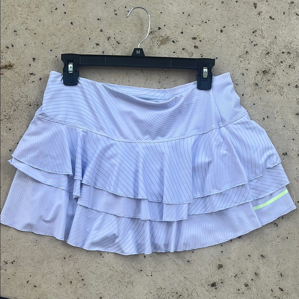 Women's Light Blue Ruffled Skirt
Lucky in Love brand 
Neon stripe at bottom